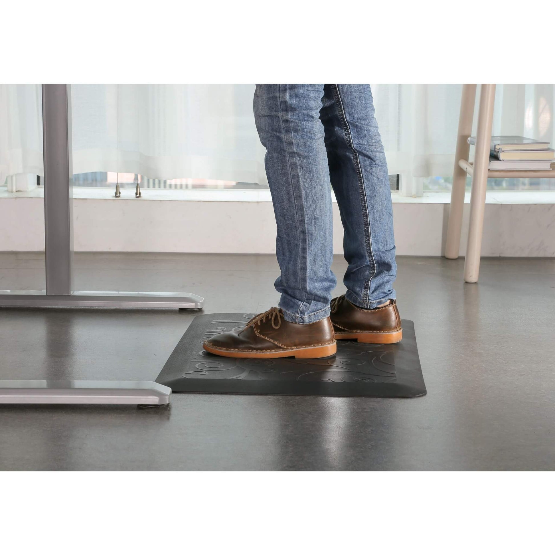 Anti-fatigue standing desk floor mat in black with pattern in use for standing desks from Livewell Furniture at www.livewellfurniture.co.uk