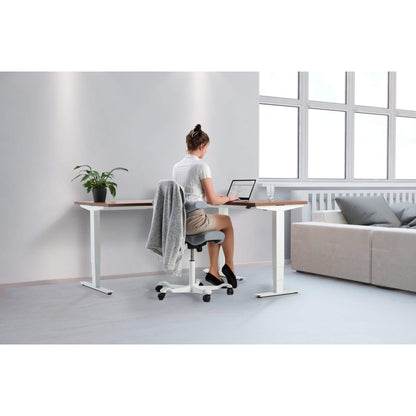 Elevate electric height adjustable standing corner desk in use from Livewell Furniture at www.livewellfurniture.co.uk