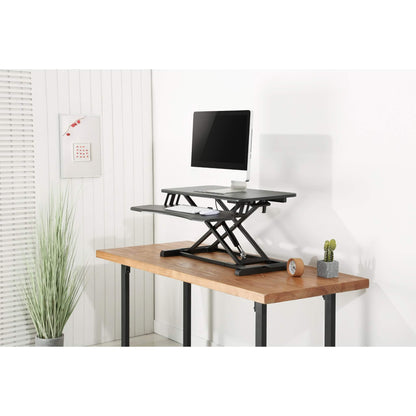 Height adjustable standing desk converter manual in black in use from Livewell Furniture at www.livewellfurniture.co.uk