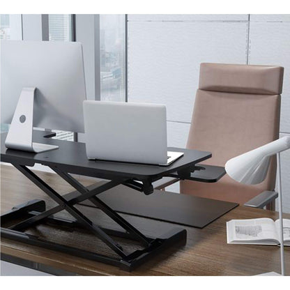 REVILO M9 manual desk converter in black and in use from Livewell Furniture at www.livewellfurniture.co.uk