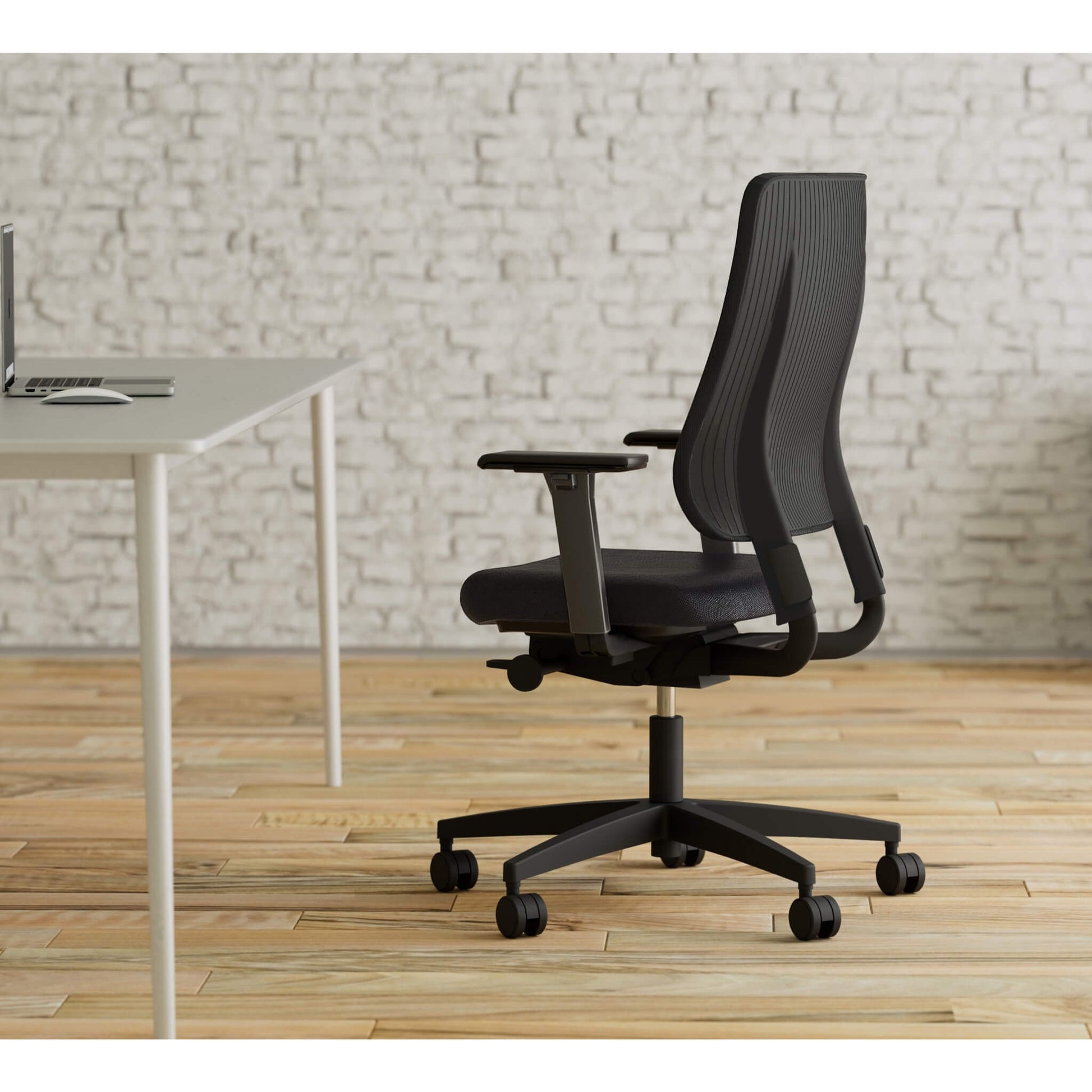 Viasit Drumback Creation swivel chair in black in use from Livewell Furniture at www.livewellfurniture.co.uk